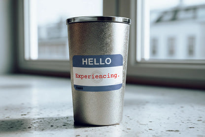 Nametag Sticker — “HELLO — Experiencing” — 3×2 in Waterproof Vinyl